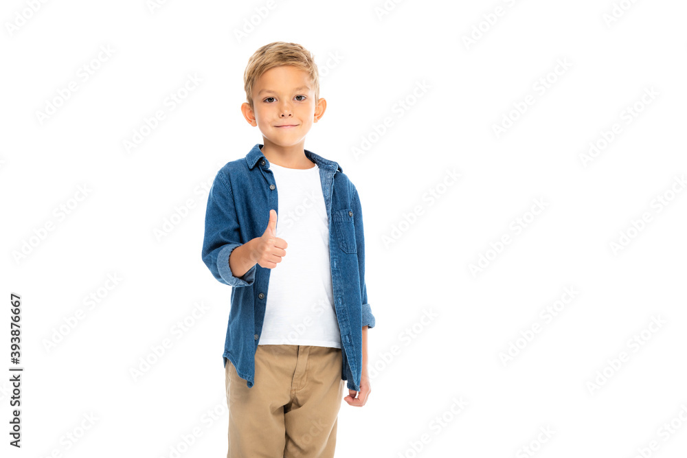 Smiling boy showing like gesture isolated on white Smiling boy showing like gesture isolated on white