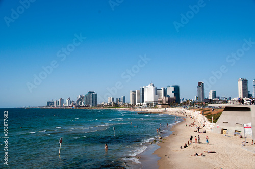 View of the city of Tel Aviv, and the beach of the Mediterranean Sea on a summer day © Viacheslav