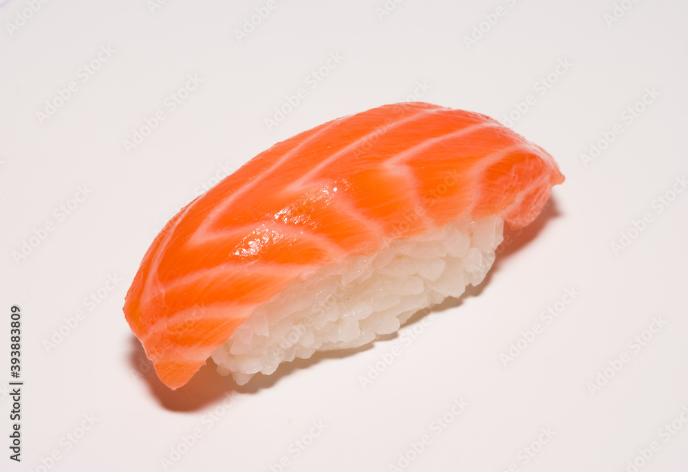 one nigiri sushi with salmon isolated on white background one nigiri sushi with salmon isolated on white background