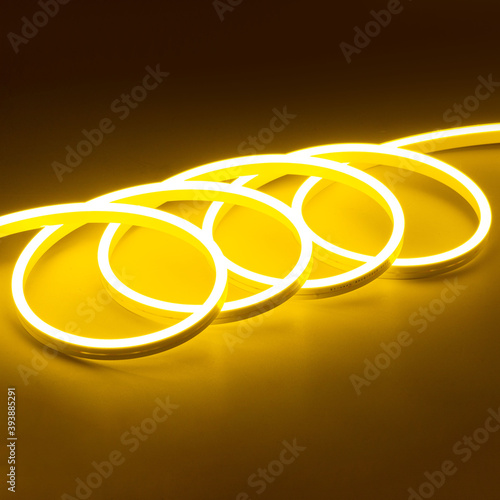 Obraz na płótnie Flexible yellow led neon decor christmas light on black backgroung
