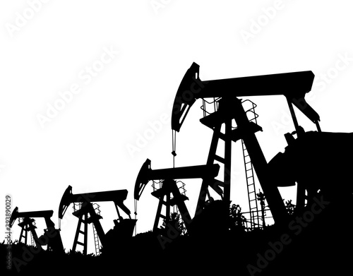 Darck silhoutte of oil rig and pumps during.