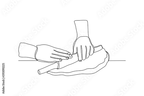 Continuous line drawing of chef hand rolling bakery pizza dough use wooden rolling pins. One line concept of bake receipt cooking. Vector illustration