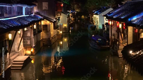 illuminated Zhouzhuang water town at night, Jiangsu, China photo