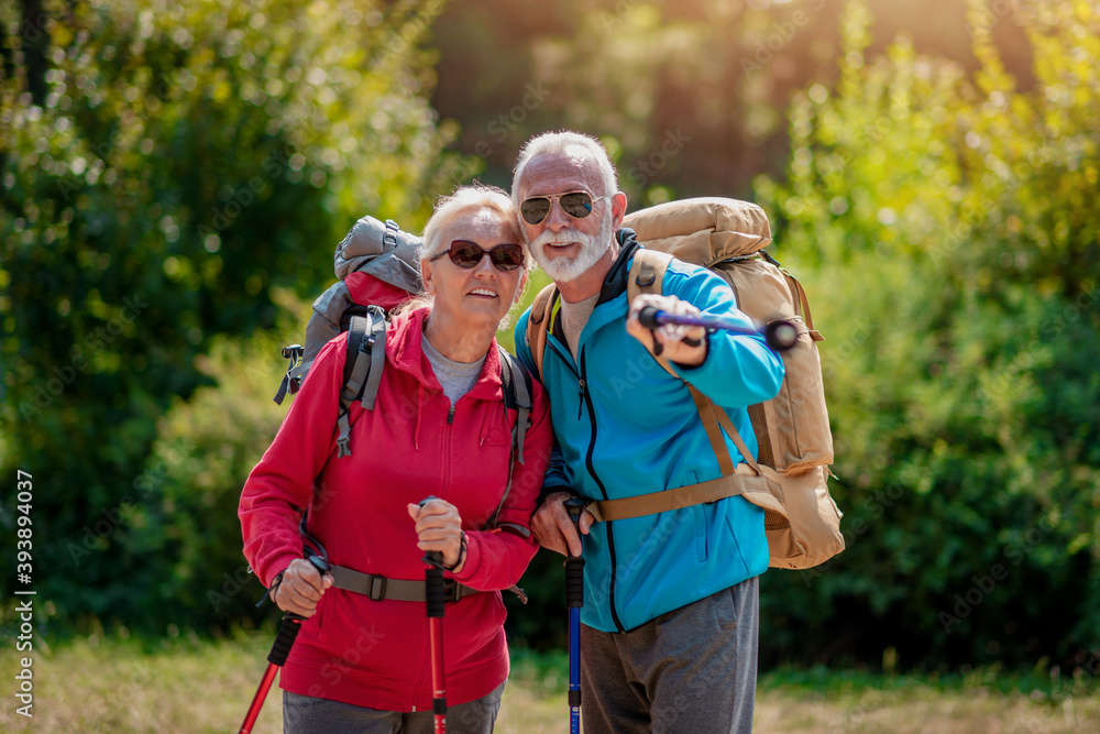 Senior couple have fun on hiking Senior couple have fun on hiking