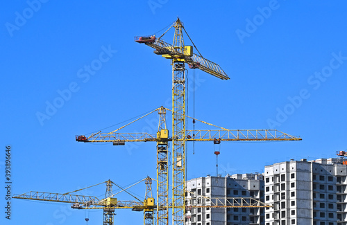 Crane and highrise construction site