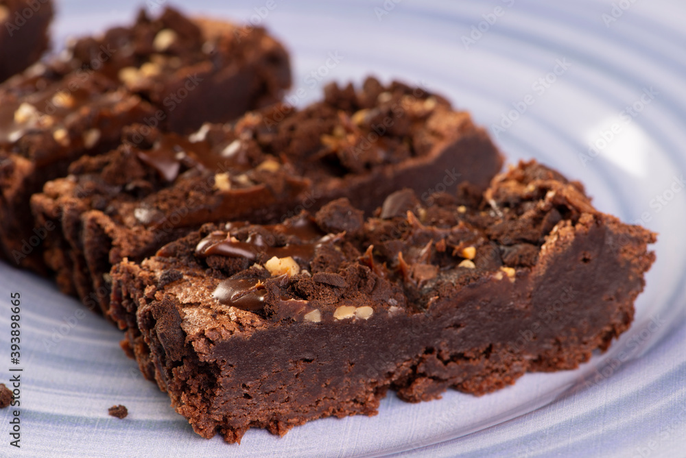 some brownie slices on a blue plate