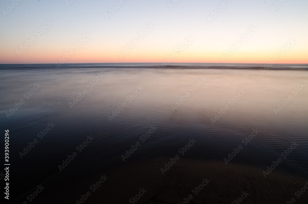 long exposure of the sea in the sunset