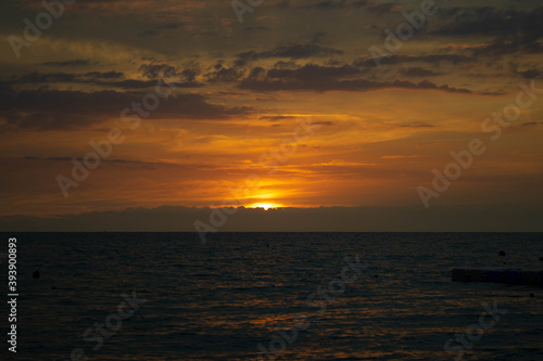 Beautiful sunset at the sea in orange tones. Photo of sunset taken in Turkey, Manavgat,2020, during the covid. © Alexandra