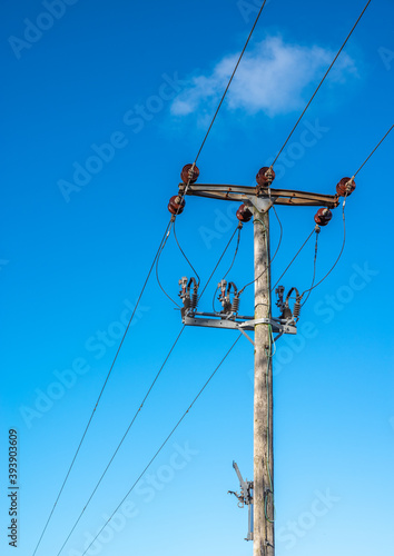 Portrait telegraph pole with jumper cables