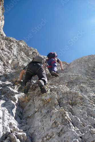 Climber at Jubilaumsgrat via ferrata, Zugspitze mountain, Germany