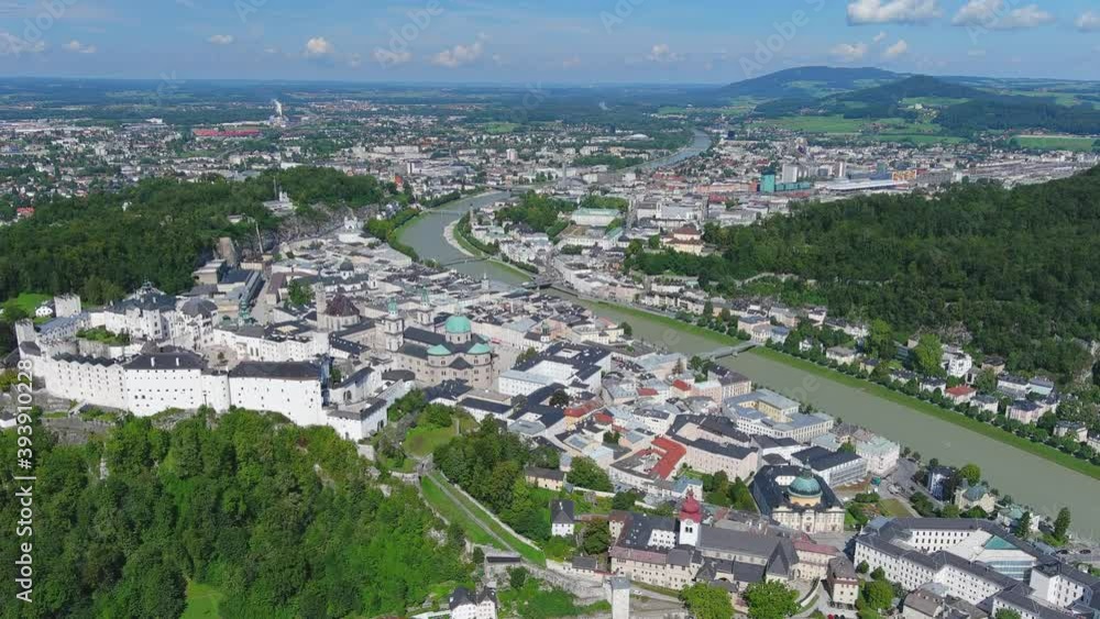 Salzburg, Austria: Aerial view of famous city landmark Fortress Hohensalzburg (Festung Hohensalzburg), medieval hilltop castle - landscape panorama of Europe from above