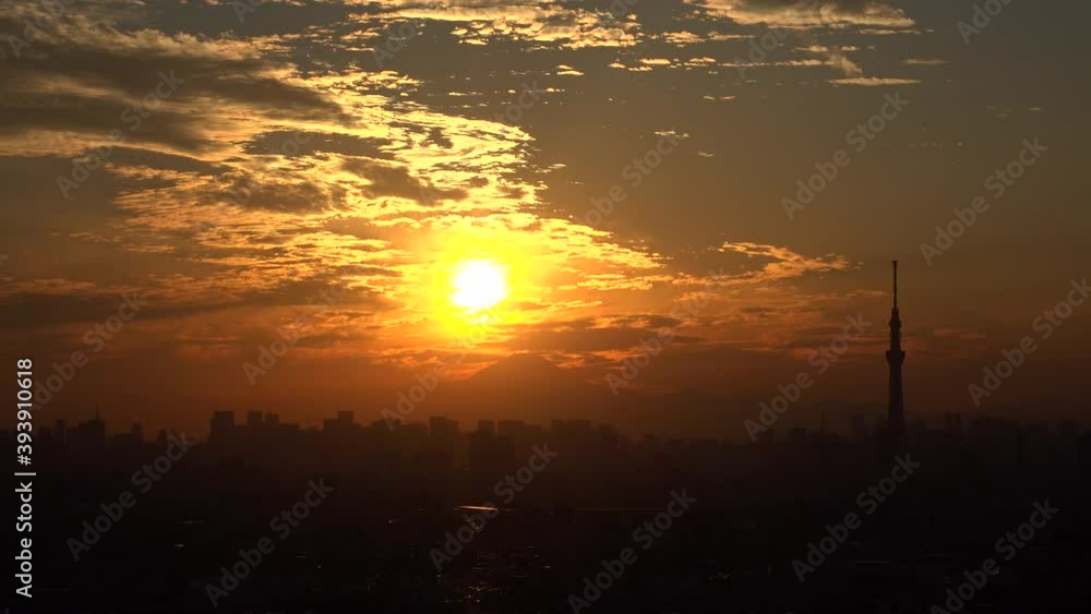 TOKYO, JAPAN : Aerial high angle sunrise or sunset view of CITYSCAPE of TOKYO and MOUNT FUJI. View of buildings at central downtown area. Japanese nature and city life concept shot. TOKYO, JAPAN : Aerial high angle sunrise or sunset view of CITYSCAPE of TOKYO and MOUNT FUJI. View of buildings at central downtown area. Japanese nature and city life concept shot.