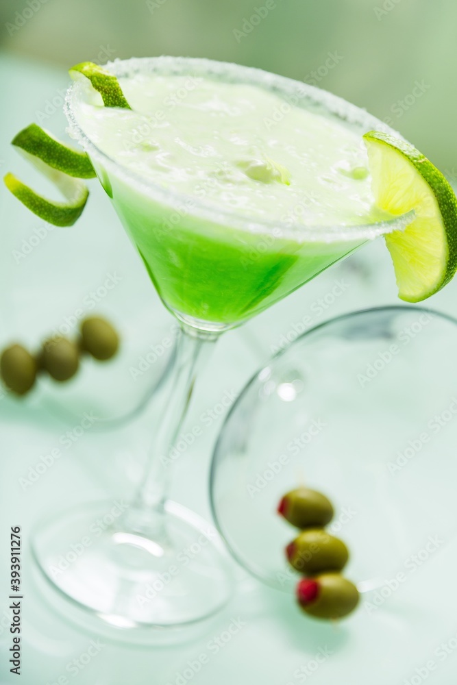 Green Cocktail with Lime Garnish Green Cocktail with Lime Garnish