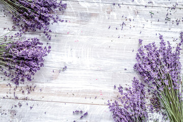 dry lavander design with bouquet on wooden background top view mockup