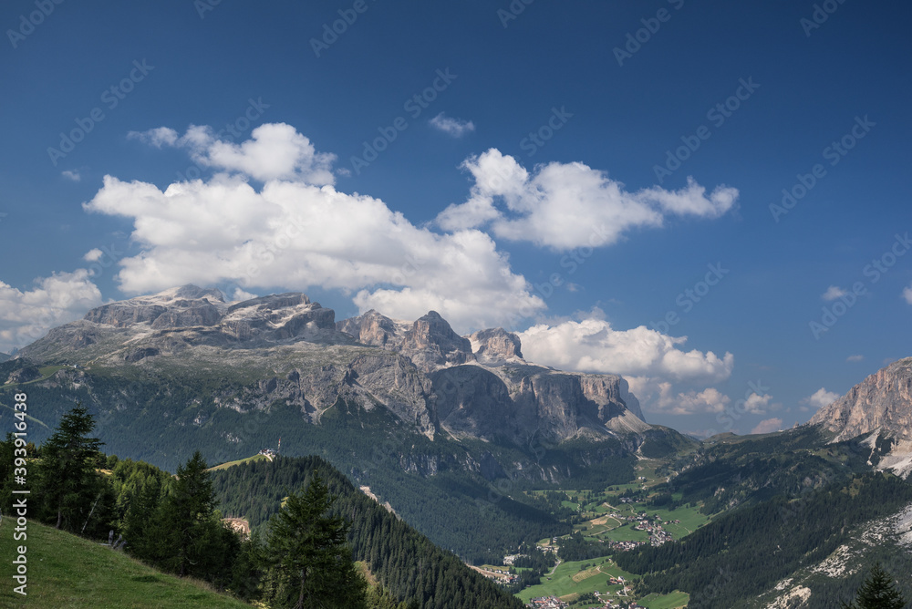 Sella mountain group and Sassongher mountain (from Left to Right) as seen from Piz La Ila and La Frainas mountain plateaus, La Villa, Val Badia, Alta Badia, Dolomites, South Tyro, Italy.