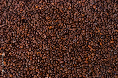 coffee beans all over the surface suitable as a background