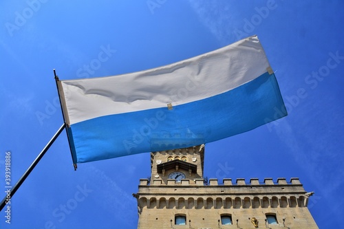 Repubblica di San Marino. La bandiera della Repubblica sventola di fronte al Palazzo del Governo durante le celebrazioni del 3 Settembre, Festa del Santo Patrono e della Fondazione della Repubblica. photo