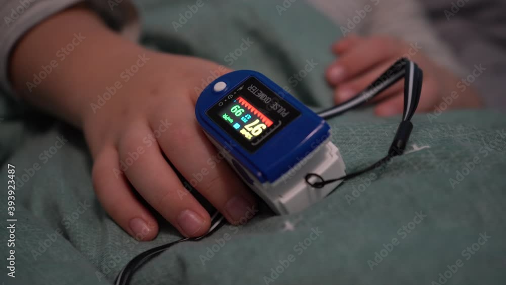 Europe, Kiev, Ukraine November 2020 Children's hands measure oxygen