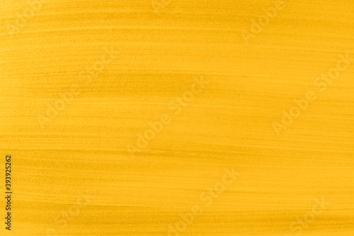 Acrylic gold paint abstract texture or painting for your banner or poster. Banner toned in trendy 2021 color