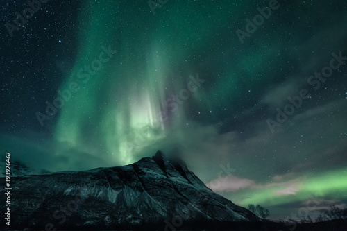 Auroras above a sharp mountain peak (2)