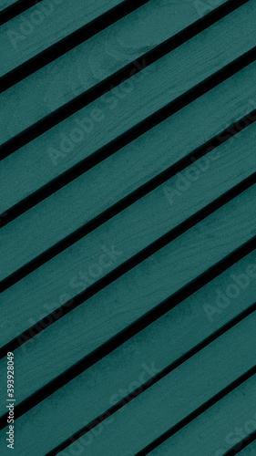 Vintage turquoise or blue wood background texture with knots.