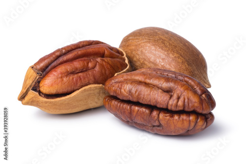 Pecan nut isolated on white background. Walnut in shell and peeled.