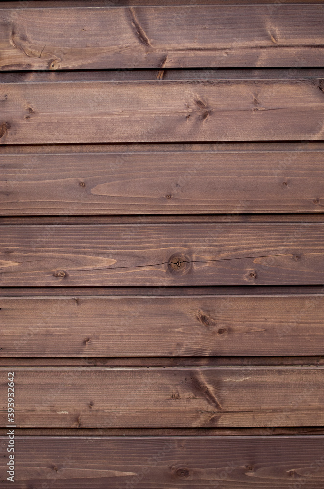 New dark brown wooden wall close New dark brown wooden wall close
