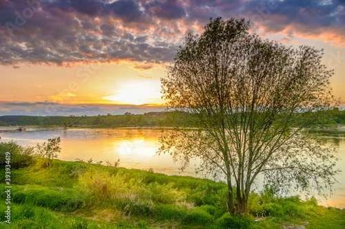 reflection in water, river in poland, Kazimierz Dolny, vistula over the sunset
