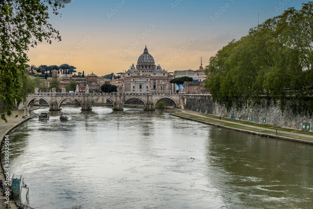 The Tevere river with the Vatican in background at sunset