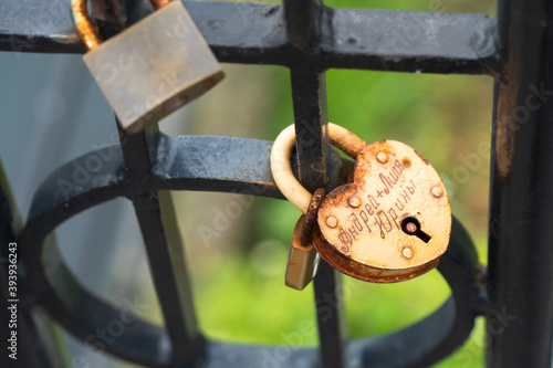 Heart shaped lock on a fence