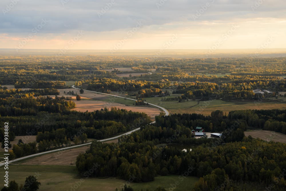 view over a road in Latvian countryside 