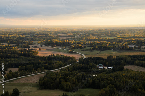 view over a road in Latvian countryside 