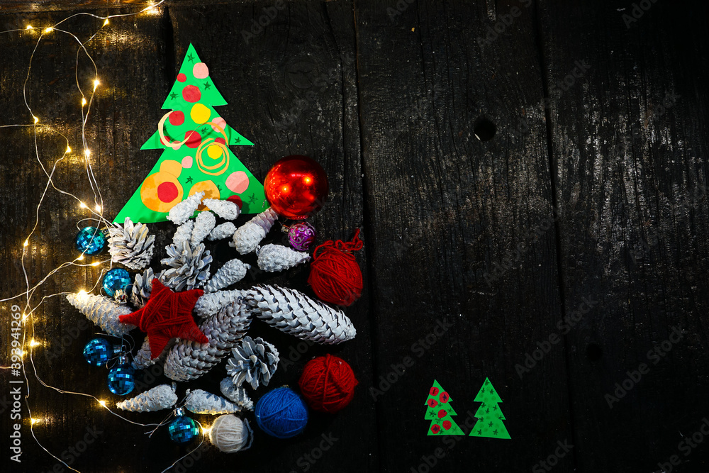mock up christmas tree with red christmas balls and new year decor on black background
