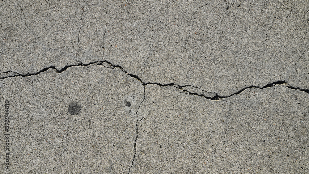 Obraz premium Texture and background for the material. Unique crack pattern on asphalt