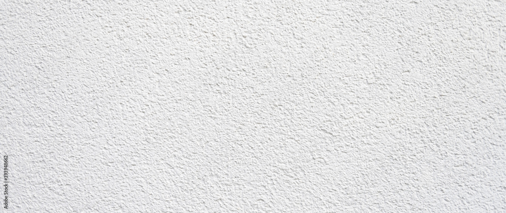 Weißer Putz auf der Aussenwand von einem Haus Weißer Putz auf der Aussenwand von einem Haus