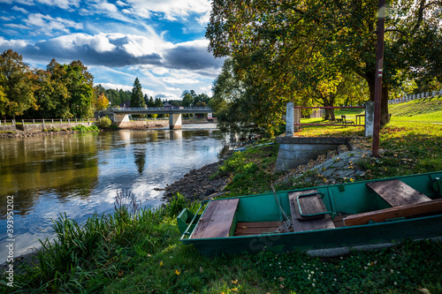 Boat on river bank, Kolodeje nad Luznici in sunny autumn day. photo