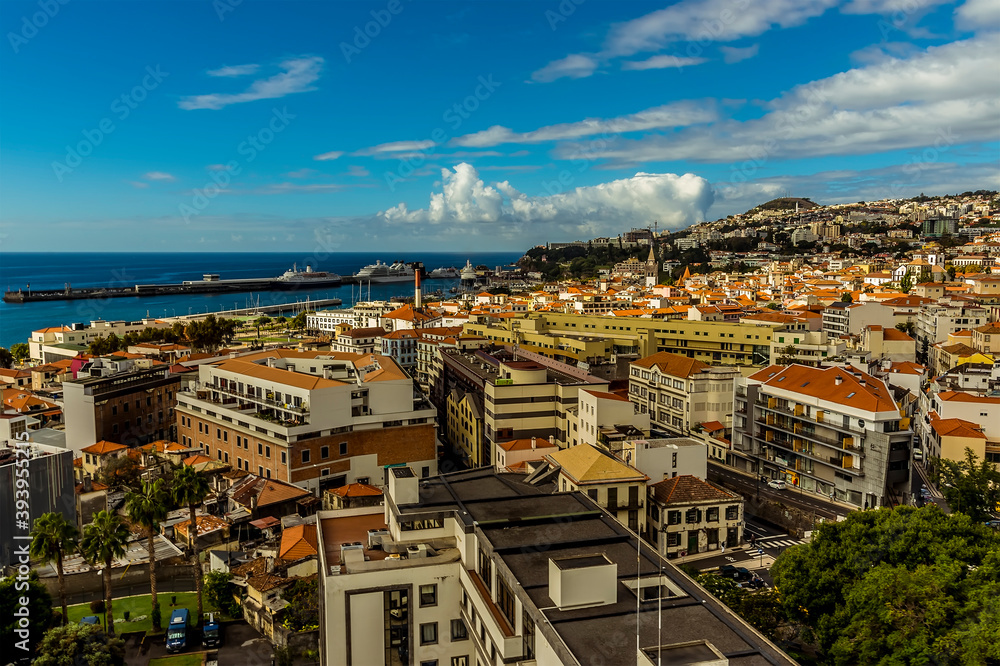 A view down over the roof tops of Funchal, Madeira from the chair lift above the city