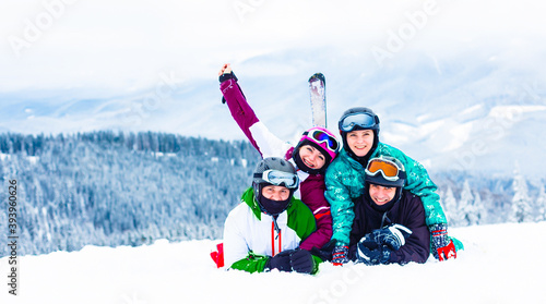 Group Of Middle Aged people On Ski Holiday In Mountains