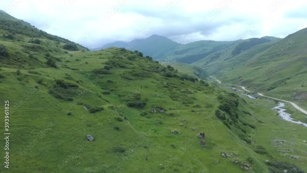 Cinematic aerial shot of an endless green mountain Caucasus Cinematic aerial shot of an endless green mountain Caucasus