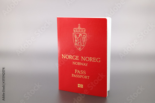 Drammen, Norway - November 20 2020: Norwegian passport on gradient background.