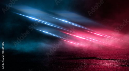 Neon futuristic landscape of a night street with neon light reflected in the water. Wet street  red and blue neon lights. Urban neon abstraction. Dark street wet asphalt reflections of rays.