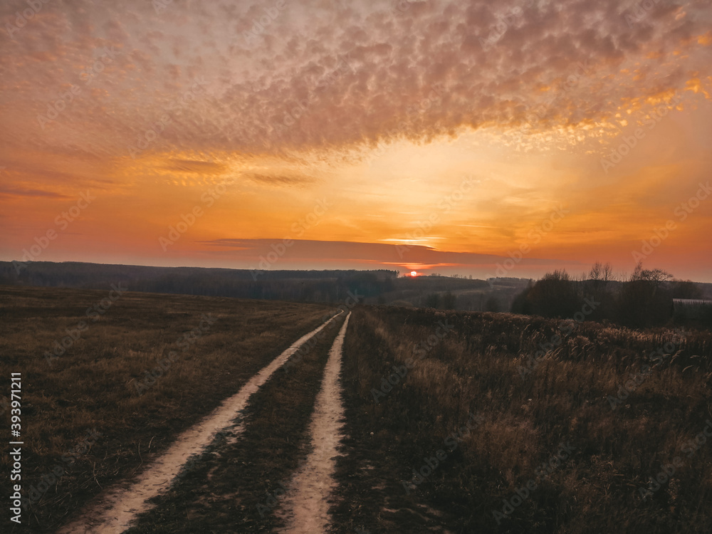 Obraz premium sunset over the road