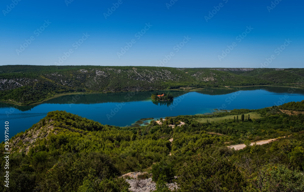 Visovac island with monastery on Krka river in National park Krka, Croatia. September 2020