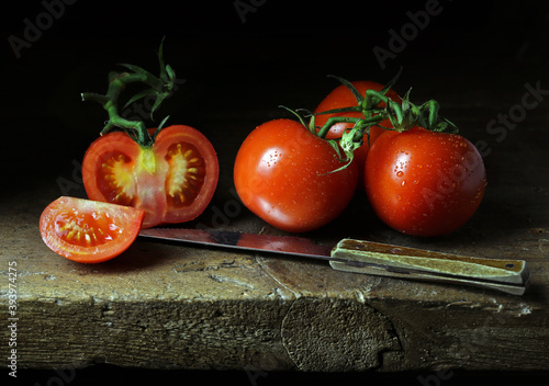 still life with tomatoes and knife