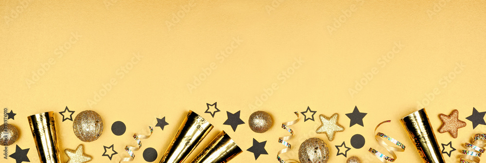 New Years Eve bottom border of shiny stars, streamers, decorations and ...
