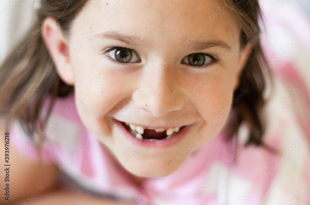 Happy Girl Smiling with Missing Front Teeth, Childhood Lifestyle Portrait Happy Girl Smiling with Missing Front Teeth, Childhood Lifestyle Portrait