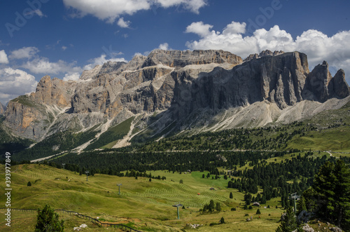 Sella group, plateau-shaped mountain massif in the Dolomites, north of the Marmolada and  east of Sasso Lungo, seen from the trail to Sella pass & Sella refuge from Comici refuge, South Tyrol, Italy. photo