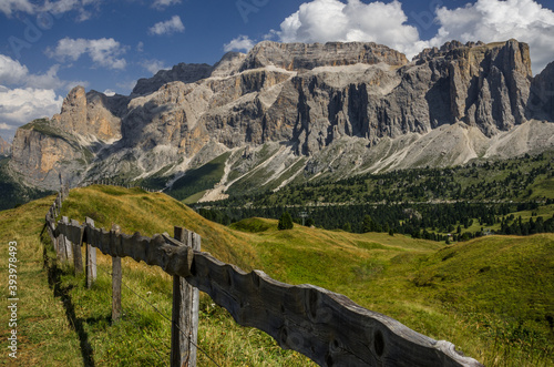 Sella group, plateau-shaped mountain massif in the Dolomites, north of the Marmolada and  east of Sasso Lungo, seen from the trail to Sella pass & Sella refuge from Comici refuge, South Tyrol, Italy. photo