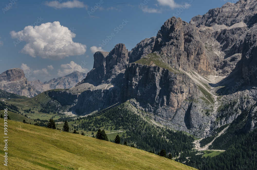 Sella group, plateau-shaped mountain massif in the Dolomites, north of the Marmolada and  east of Sasso Lungo, seen from the trail to Sella pass & Sella refuge from Comici refuge, South Tyrol, Italy.