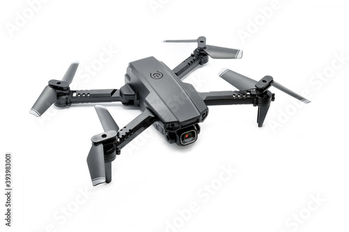 Closeup of black modern copter with camera isolated on white background. Technology of unmanned flying.